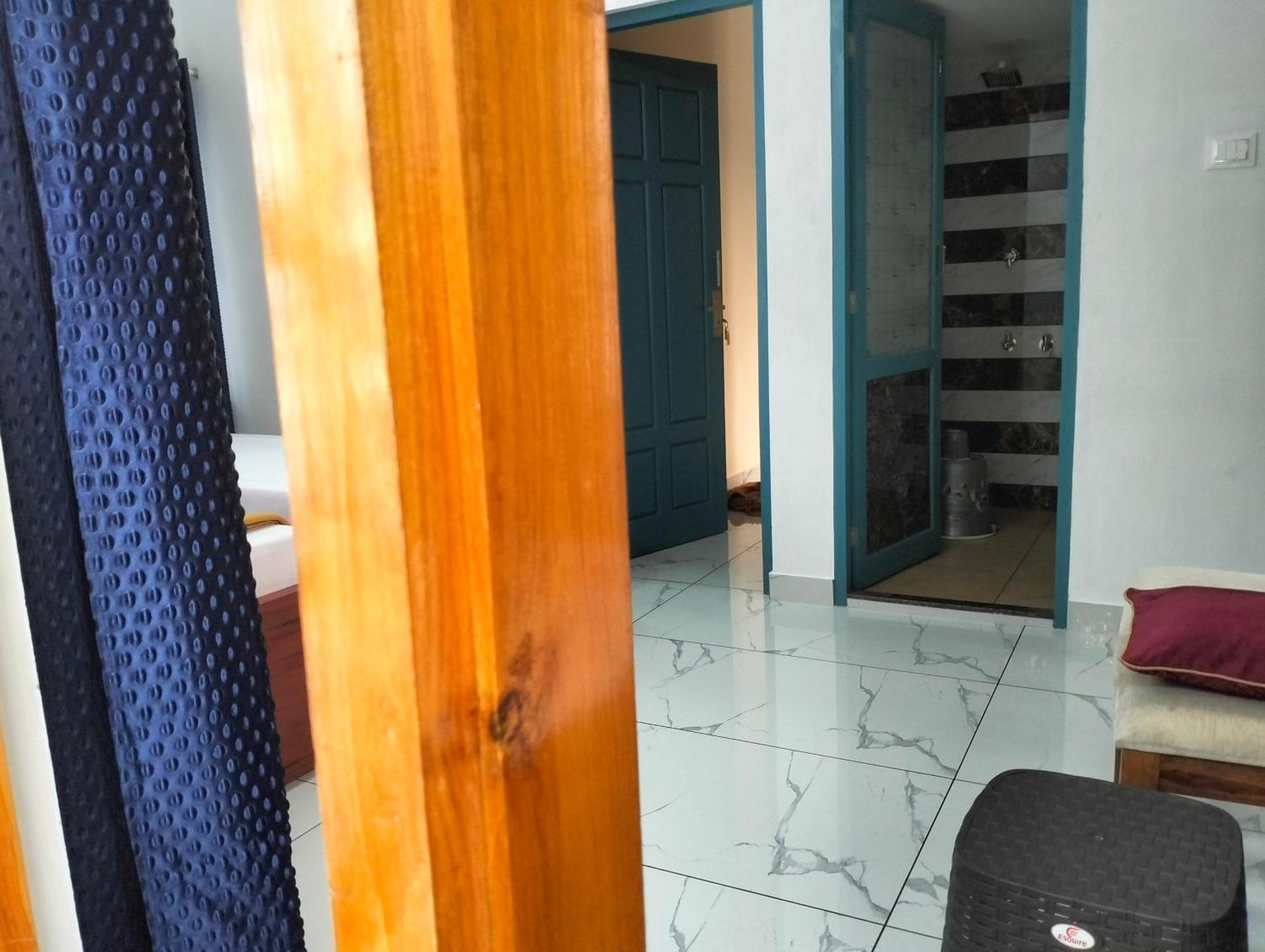 Guestland Homestay Kochi Buitenkant foto
