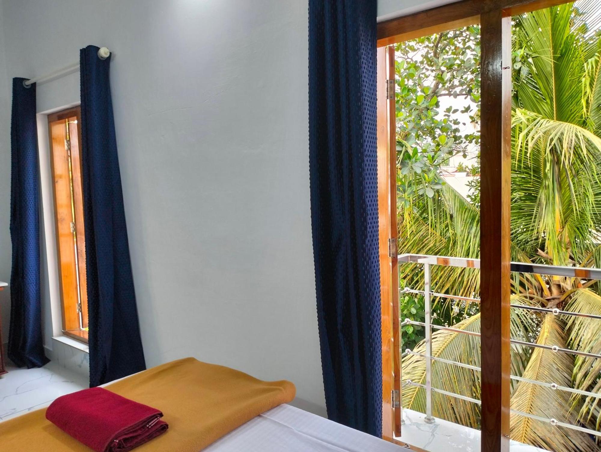 Guestland Homestay Kochi Buitenkant foto