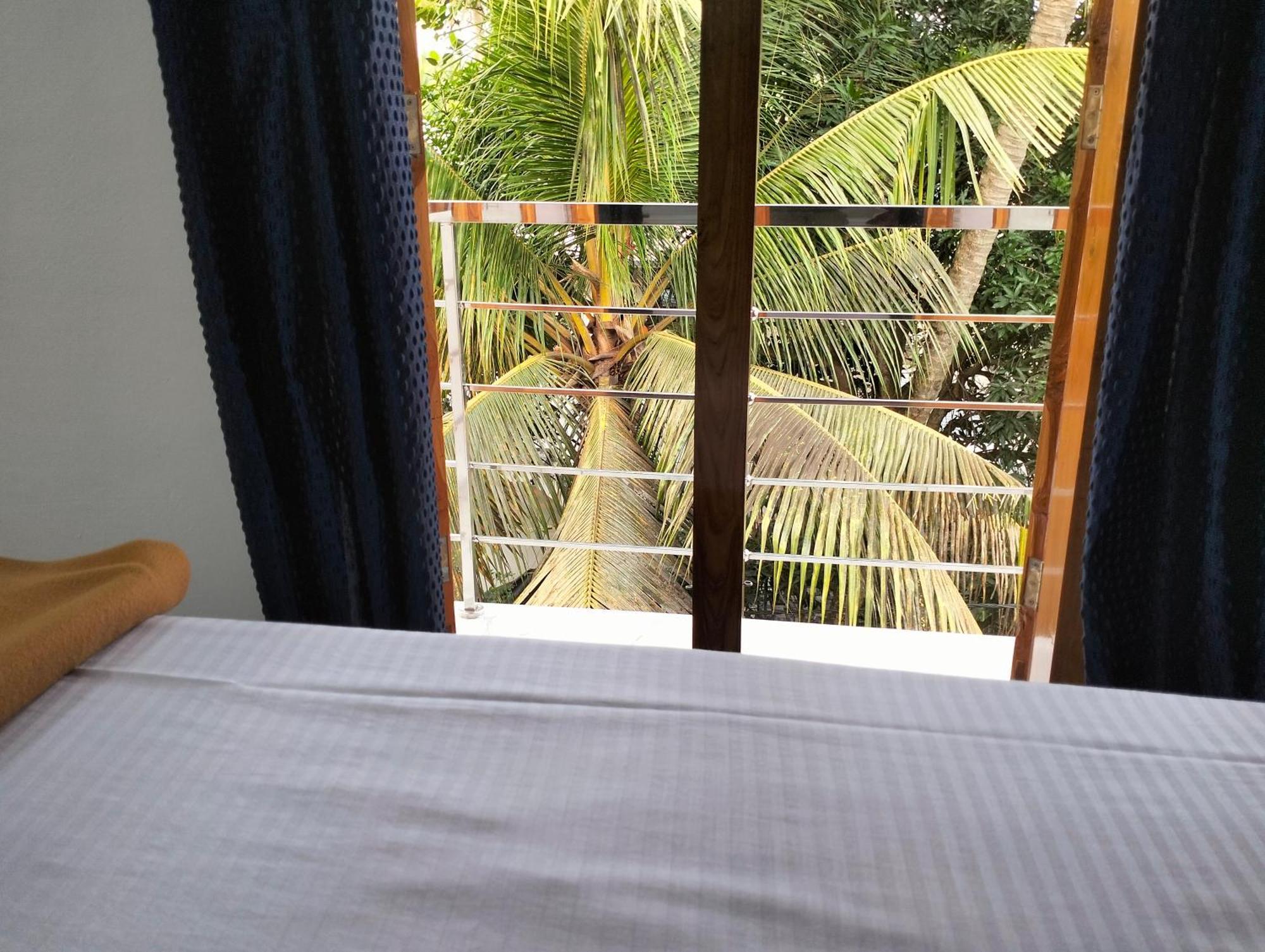 Guestland Homestay Kochi Buitenkant foto