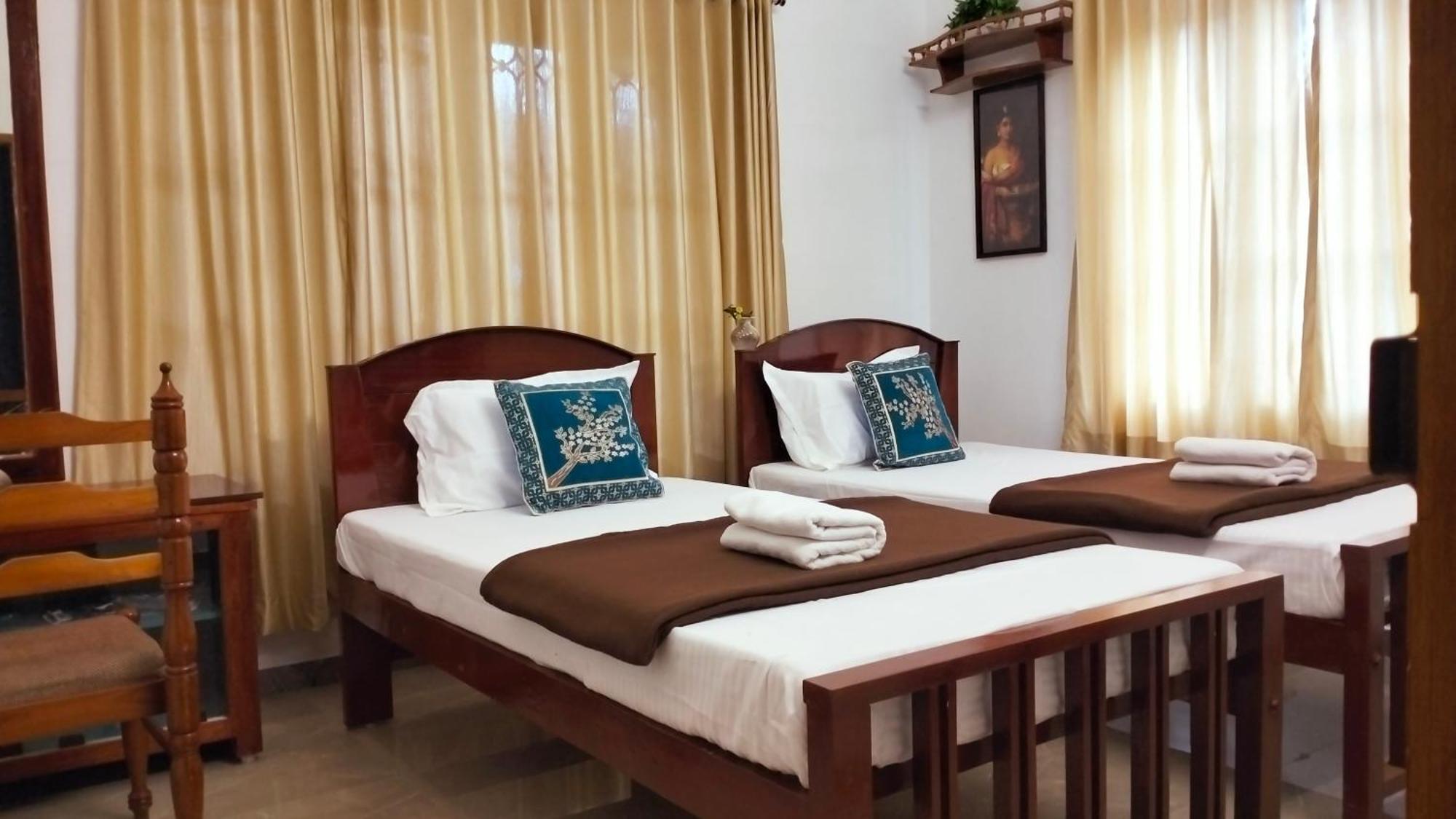 Guestland Homestay Kochi Buitenkant foto